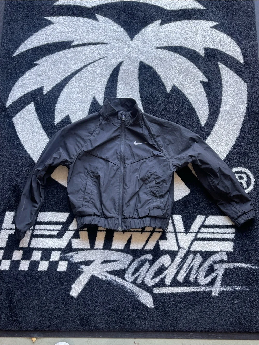 Nike Kids Black Lightweight Windbreaker Jacket with White Swoosh